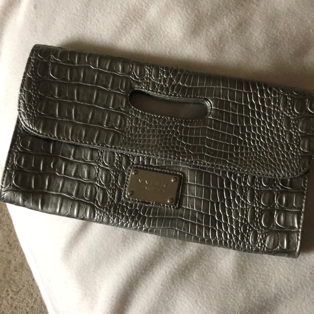 nine west metallic snake skin clutch